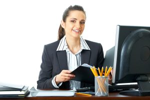 Female office worker ay her desk