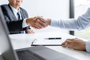 Handshake while job interviewing,