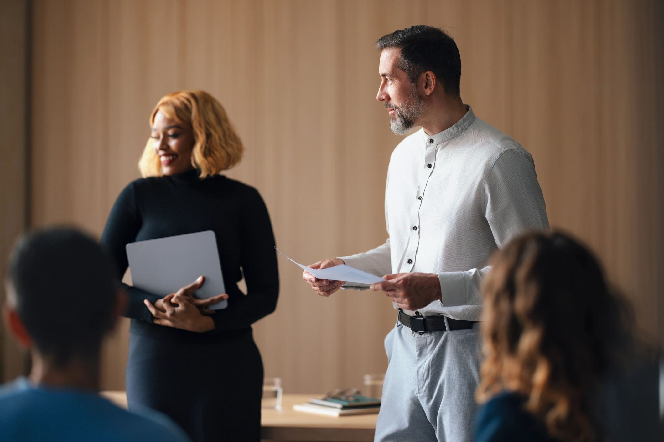 Business leaders presenting strategy in an office meeting